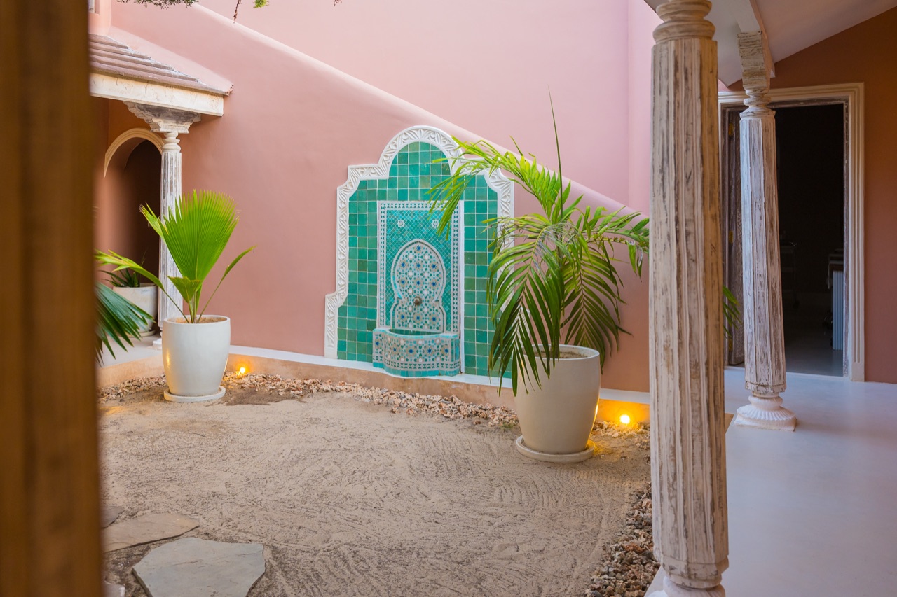 The tiled fountain courtyard at The Majlis Spa